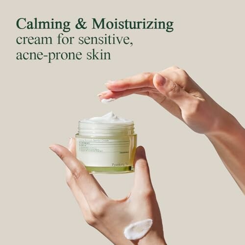 Hands applying calming and moisturizing cream for sensitive, acne-prone skin.