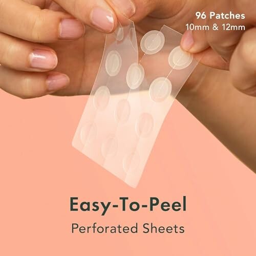 Hands holding easy-to-peel perforated acne patches.
