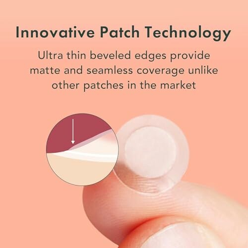 Close-up of a hand holding a thin patch with beveled edges.